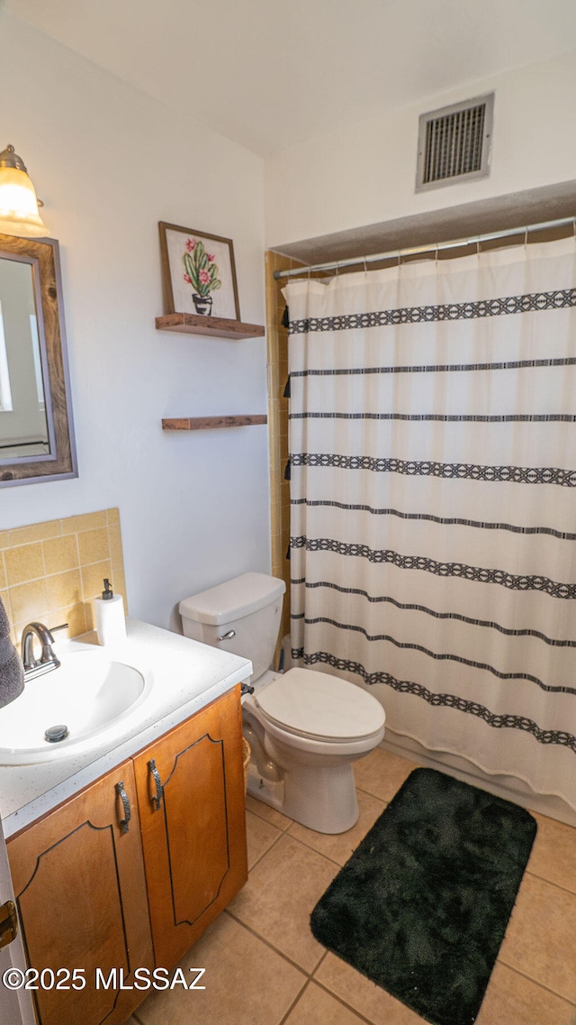 full bathroom with tile patterned flooring, vanity, visible vents, and toilet