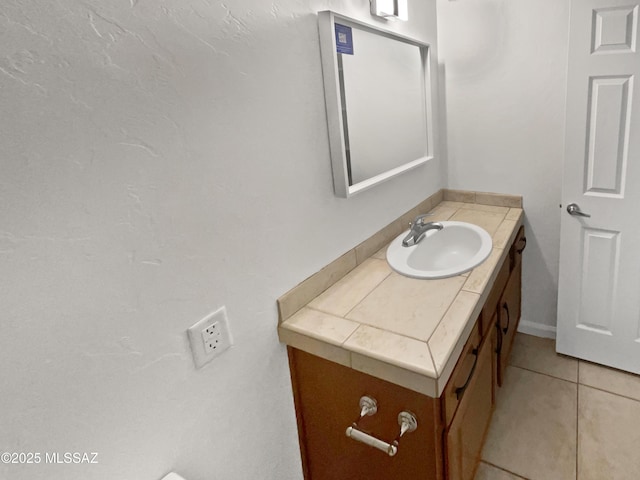 bathroom featuring vanity and tile patterned floors