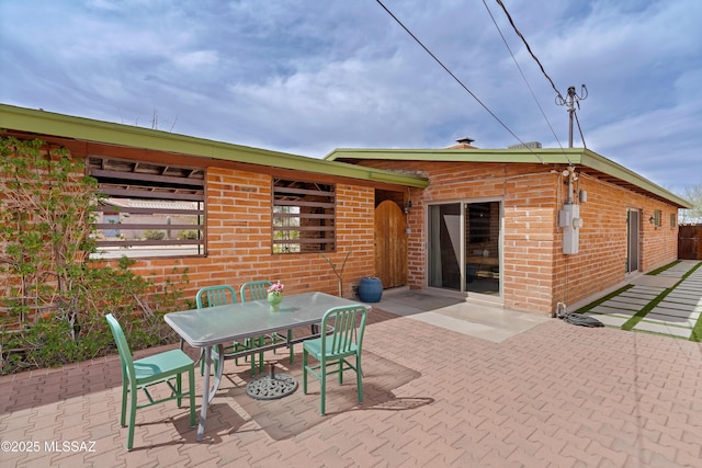 view of patio with outdoor dining area