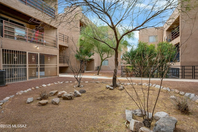 surrounding community featuring fence