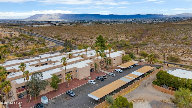 drone / aerial view featuring a mountain view