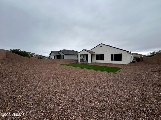 exterior space with a patio and fence