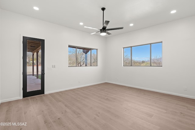 unfurnished room featuring recessed lighting, baseboards, light wood-style flooring, and ceiling fan