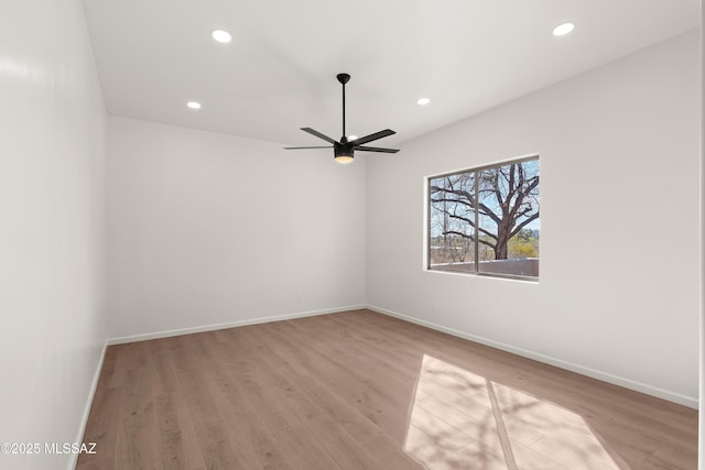 unfurnished room with recessed lighting, ceiling fan, baseboards, and wood finished floors