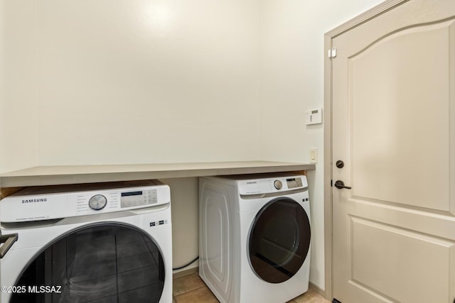 laundry area featuring laundry area and separate washer and dryer