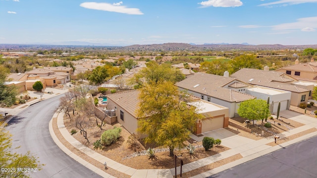 aerial view featuring a mountain view and a residential view