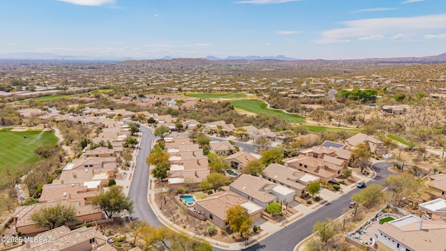 birds eye view of property featuring a mountain view and a residential view