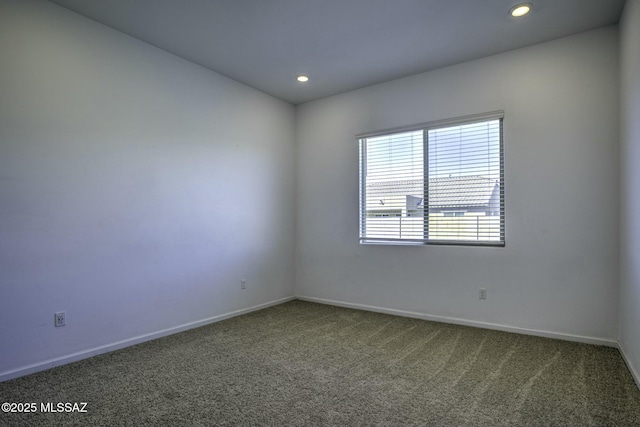 empty room with recessed lighting, baseboards, and carpet floors