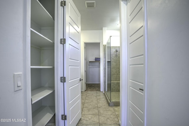 hall featuring visible vents