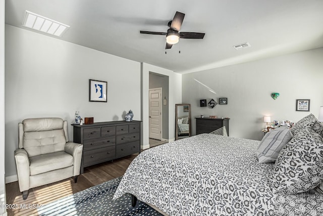 8707 N Ash Grove Ct, Tucson, AZ 85742 - bedroom with wood finished floors and ceiling fan