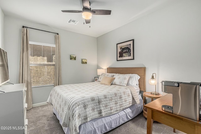 8707 N Ash Grove Ct, Tucson, AZ 85742 - bedroom featuring light colored carpet and ceiling fan