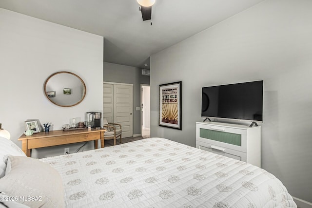 8707 N Ash Grove Ct, Tucson, AZ 85742 - bedroom with a ceiling fan and a closet