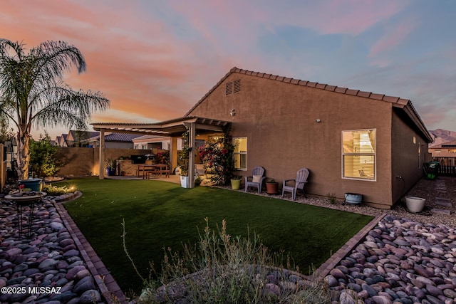 8707 N Ash Grove Ct, Tucson, AZ 85742 - rear view of house with a fenced backyard, stucco siding, a patio, and a pergola