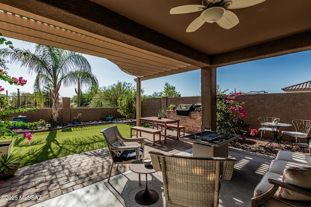 8707 N Ash Grove Ct, Tucson, AZ 85742 - fenced backyard featuring a patio, outdoor lounge area, a ceiling fan, and a pergola