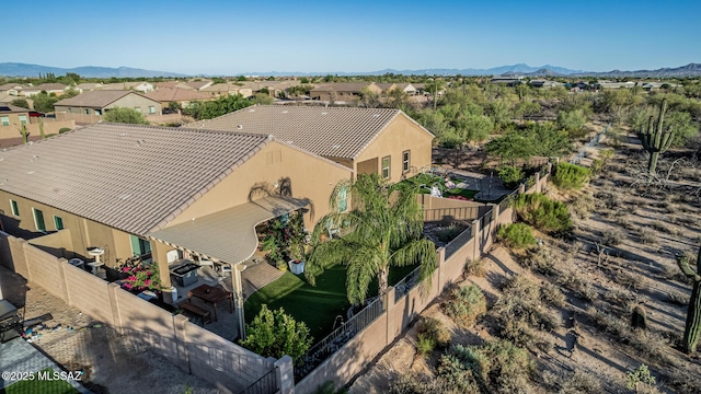 8707 N Ash Grove Ct, Tucson, AZ 85742 - aerial view of residential area featuring a mountainous background
