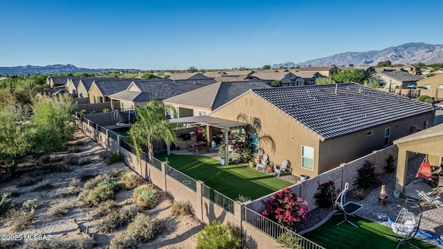 8707 N Ash Grove Ct, Tucson, AZ 85742 - aerial perspective of suburban area with a mountainous background