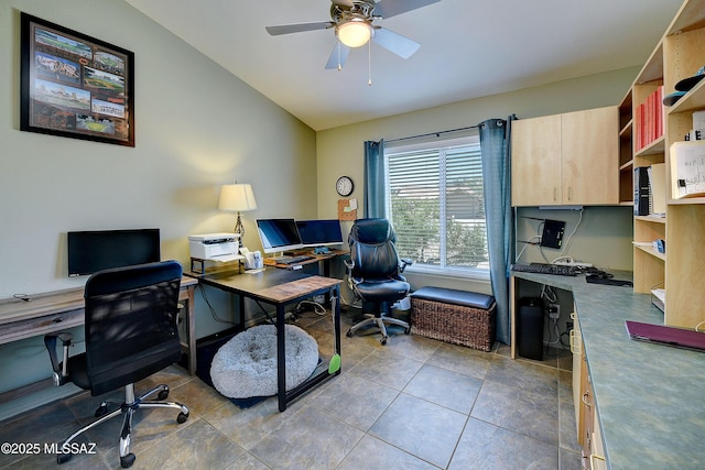 office space featuring ceiling fan and vaulted ceiling