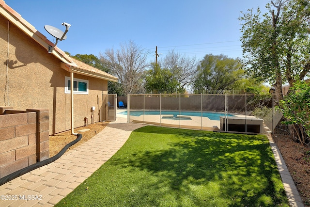 view of yard featuring a fenced in pool and a fenced backyard