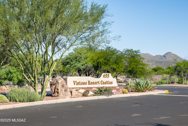community sign featuring a mountain view