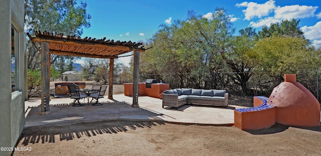 view of patio / terrace featuring fence, a pergola, and an outdoor hangout area