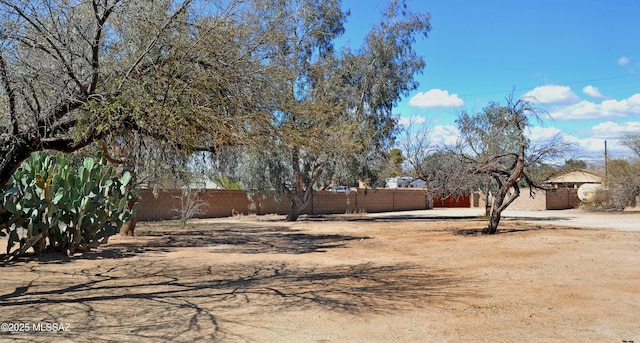 view of yard featuring fence