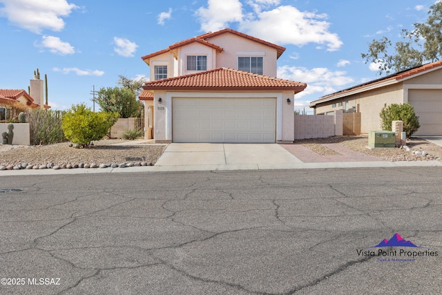 view of front facade with fence, driveway, stucco siding, a garage, and a tile roof