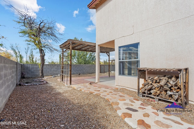 view of yard with a patio and a fenced backyard