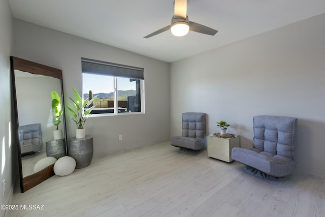 5391 W El Camino Del Cerro, Tucson, AZ 85745 - living area with wood finished floors, ceiling fan, and baseboards