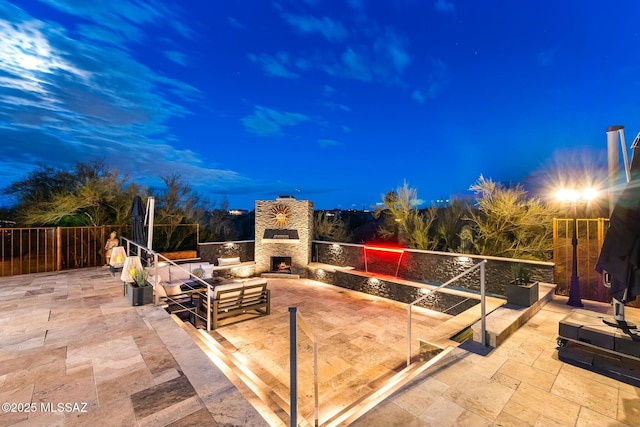 5391 W El Camino Del Cerro, Tucson, AZ 85745 - view of patio featuring an outdoor stone fireplace