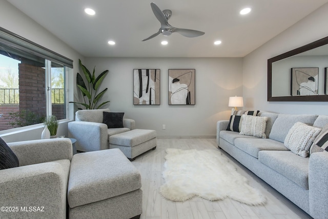 5391 W El Camino Del Cerro, Tucson, AZ 85745 - living area featuring recessed lighting, a ceiling fan, wood finished floors, and baseboards