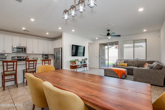 dining room featuring light tile patterned floors, visible vents, recessed lighting, and ceiling fan