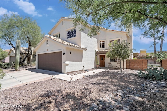 715 W Annandale Way, Tucson, AZ 85737 - mediterranean / spanish home featuring a tiled roof, stucco siding, and driveway