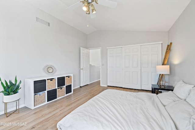 715 W Annandale Way, Tucson, AZ 85737 - bedroom featuring wood finished floors, lofted ceiling, a closet, ceiling fan, and baseboards