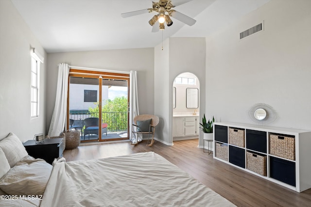 715 W Annandale Way, Tucson, AZ 85737 - bedroom featuring vaulted ceiling, access to outside, wood finished floors, ensuite bathroom, and a ceiling fan