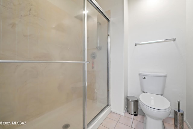 715 W Annandale Way, Tucson, AZ 85737 - bathroom featuring a stall shower, tile patterned flooring, toilet, and baseboards