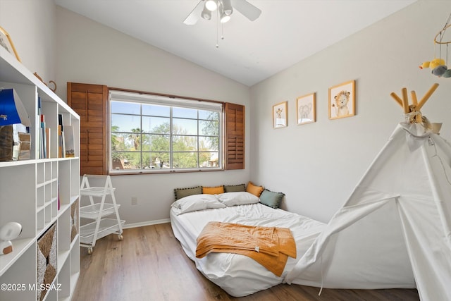 715 W Annandale Way, Tucson, AZ 85737 - bedroom with lofted ceiling, wood finished floors, baseboards, and a ceiling fan
