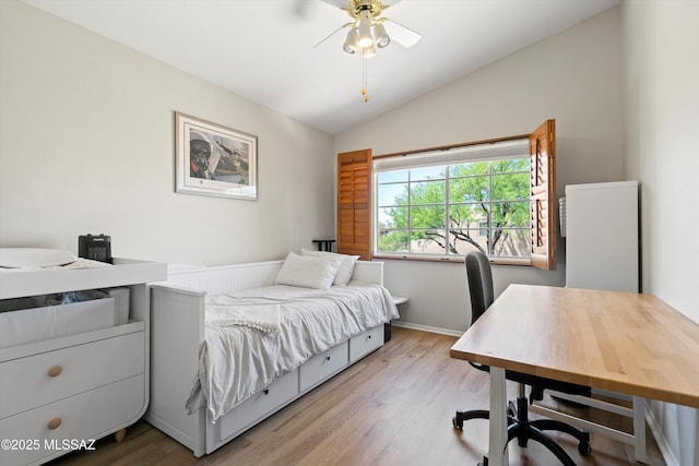 715 W Annandale Way, Tucson, AZ 85737 - bedroom with lofted ceiling, wood finished floors, a desk, and a ceiling fan