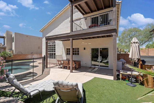 715 W Annandale Way, Tucson, AZ 85737 - back of house with a balcony, stucco siding, and a patio area