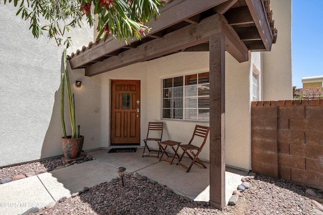 715 W Annandale Way, Tucson, AZ 85737 - view of exterior entry featuring stucco siding and covered porch