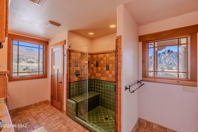 8060 E Diamondback Rd, Saint David, AZ 85630 - full bathroom featuring recessed lighting, a stall shower, a mountain view, and baseboards