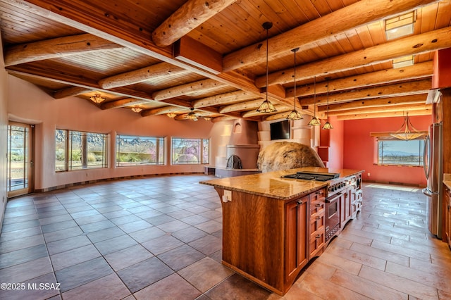 8060 E Diamondback Rd, Saint David, AZ 85630 - kitchen featuring stainless steel appliances, brown cabinetry, wood ceiling, and open floor plan