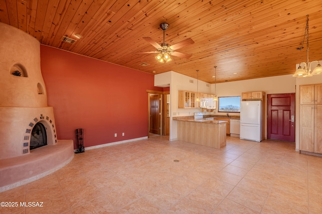 8060 E Diamondback Rd, Saint David, AZ 85630 - kitchen featuring wood ceiling, a fireplace, a peninsula, glass insert cabinets, and white appliances