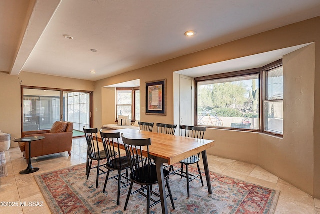 dining space with recessed lighting