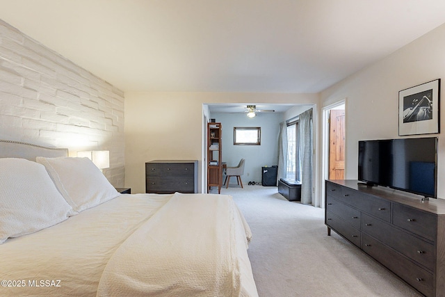 bedroom featuring light carpet