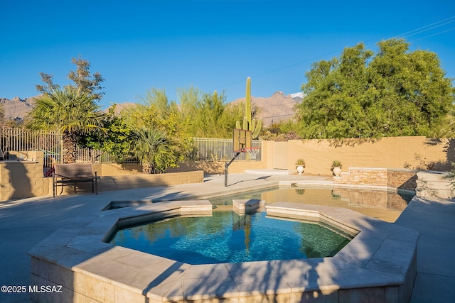 view of swimming pool with a fenced in pool, a patio, and a fenced backyard