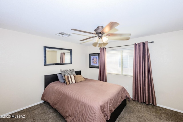 carpeted bedroom with baseboards, visible vents, and ceiling fan