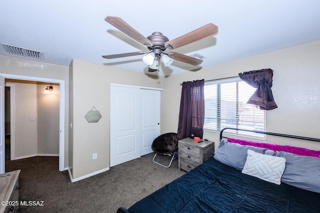 bedroom with visible vents, a closet, carpet floors, baseboards, and ceiling fan