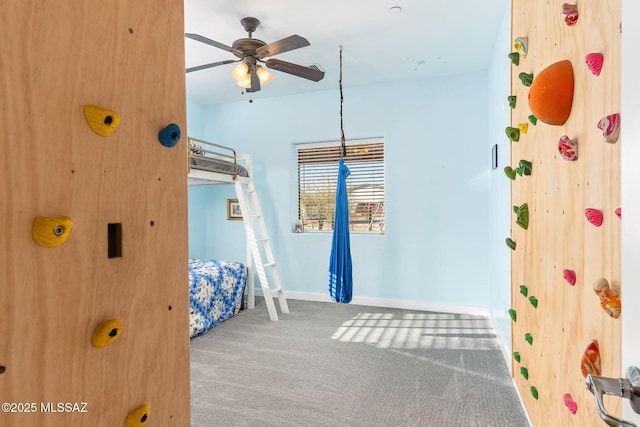 carpeted bedroom with baseboards