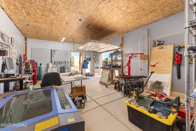 miscellaneous room featuring unfinished concrete flooring