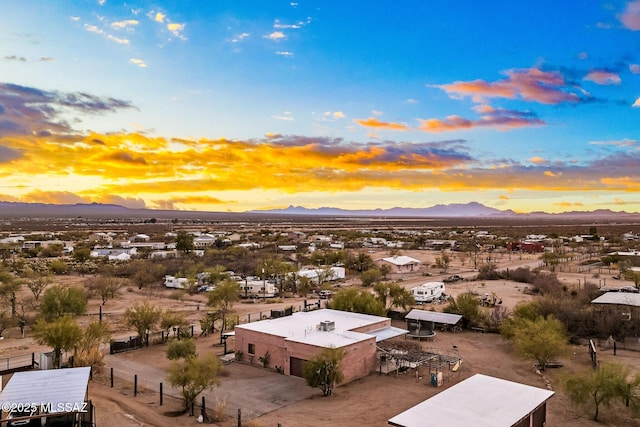 aerial view at dusk with a mountain view